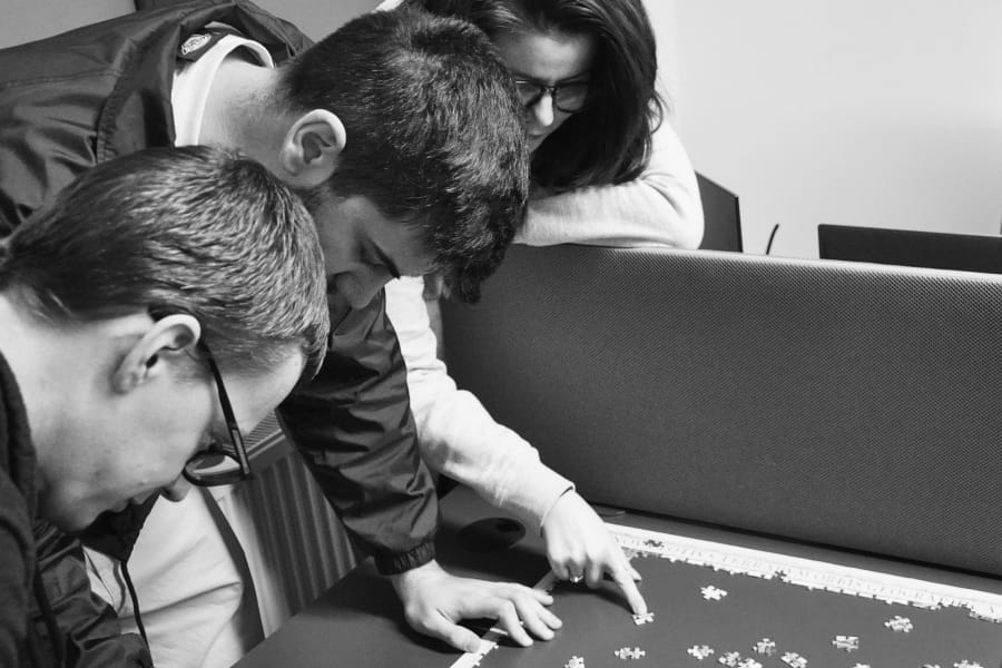 Colleagues working through a problem together